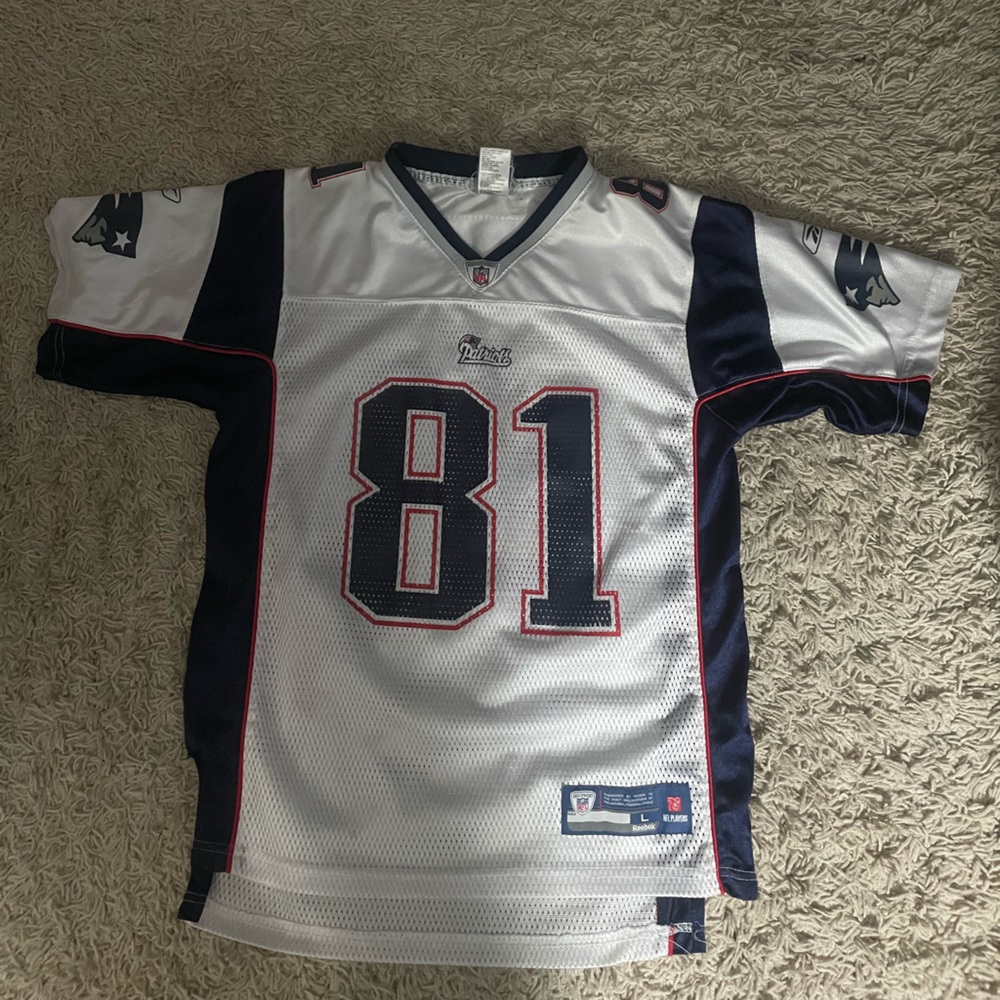 Boys Randy Moss jersey size XL, 14-16.